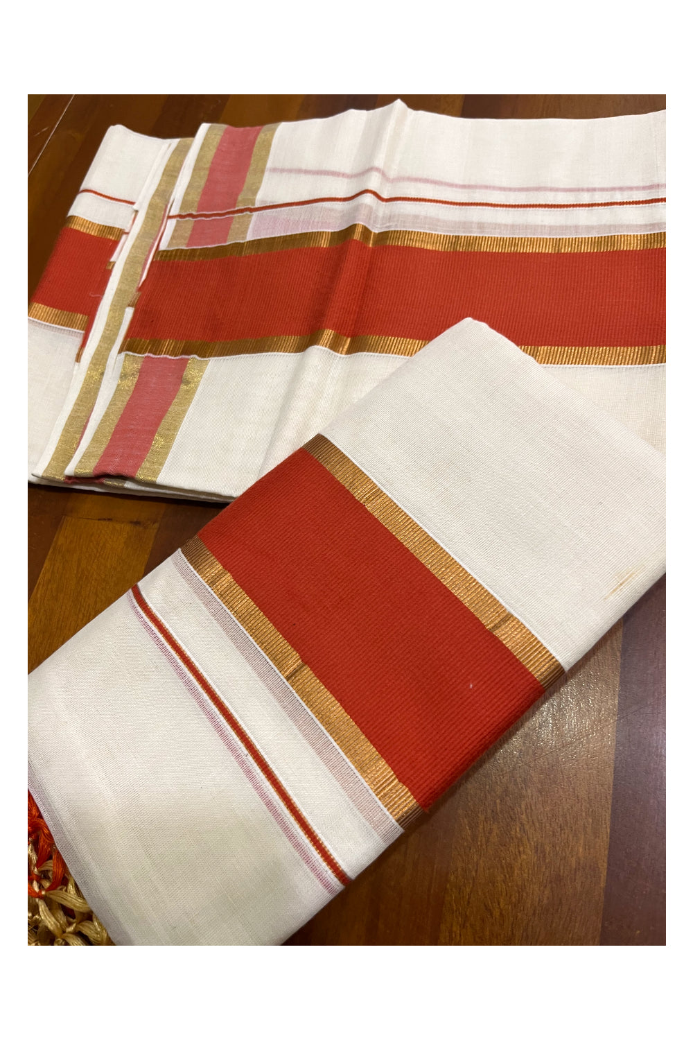 Cotton Kerala Set Mundu (Mundum Neriyathum) with Orange and Kasavu Border and Tassels