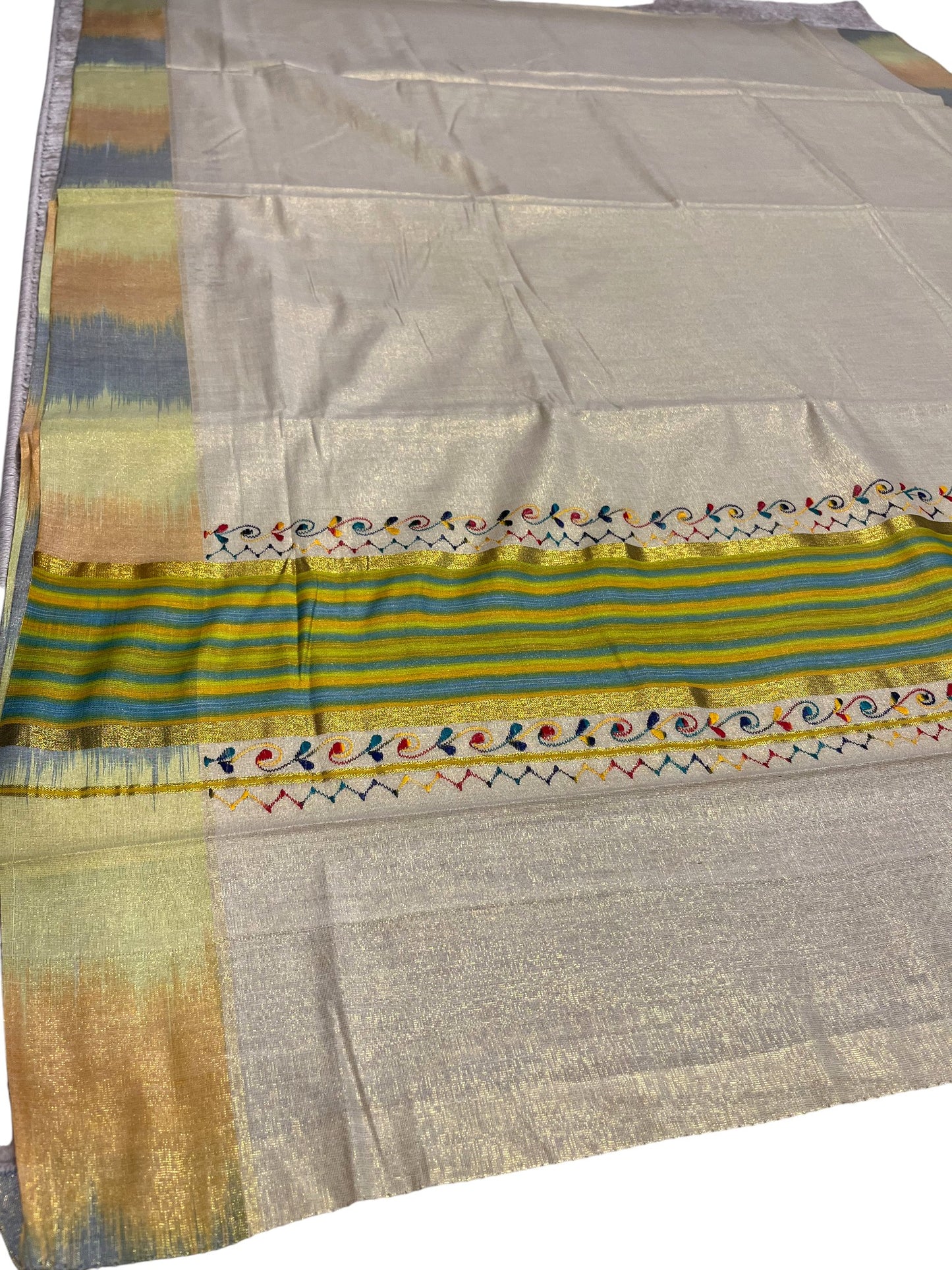 Southloom Kerala Tissue Kasavu Saree with Multi Colour Pochampally Design on Borders and Kara