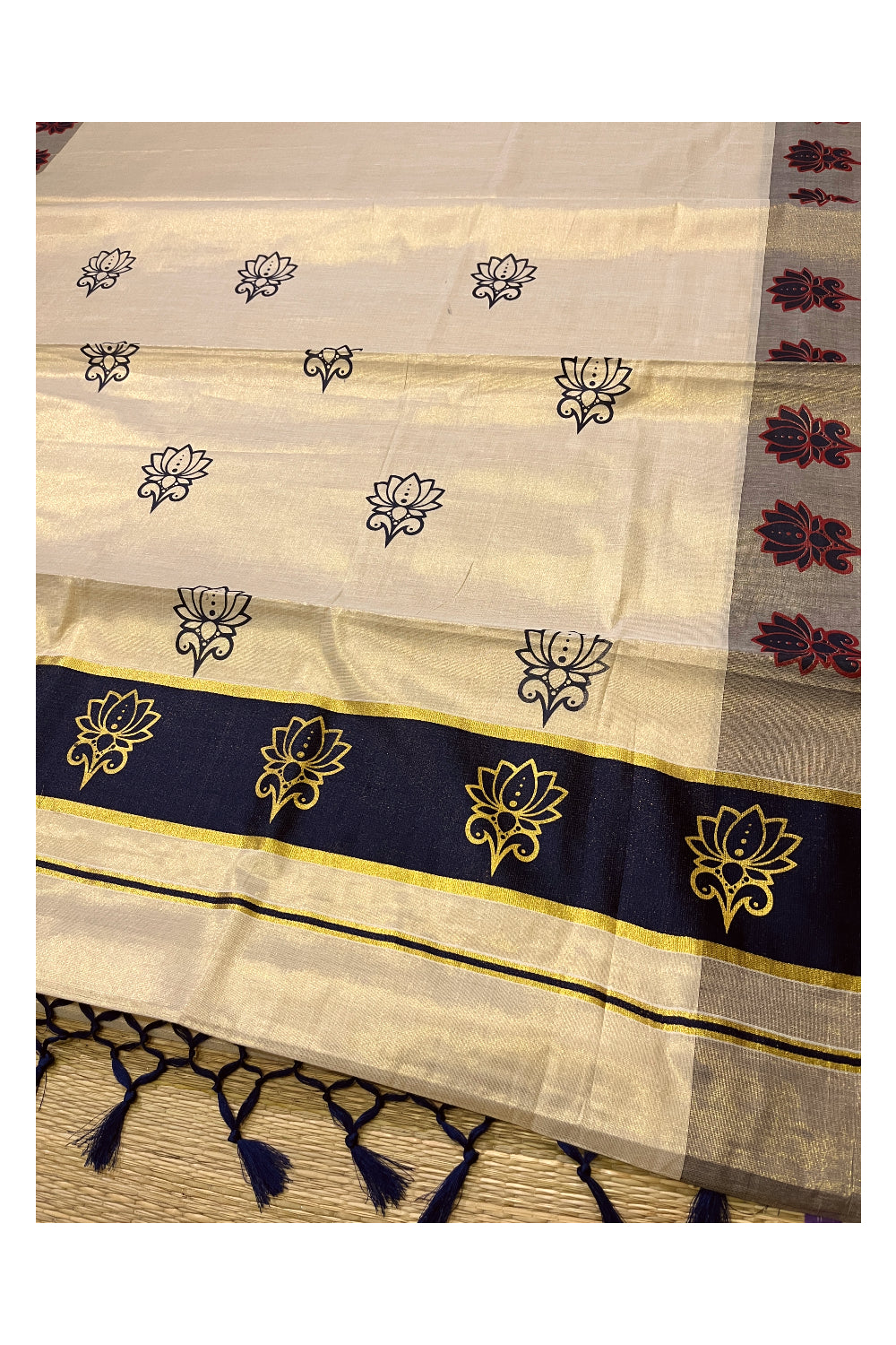 Kerala Tissue Kasavu Saree with Navy Blue and Golden Block Prints and Navy Blue Border