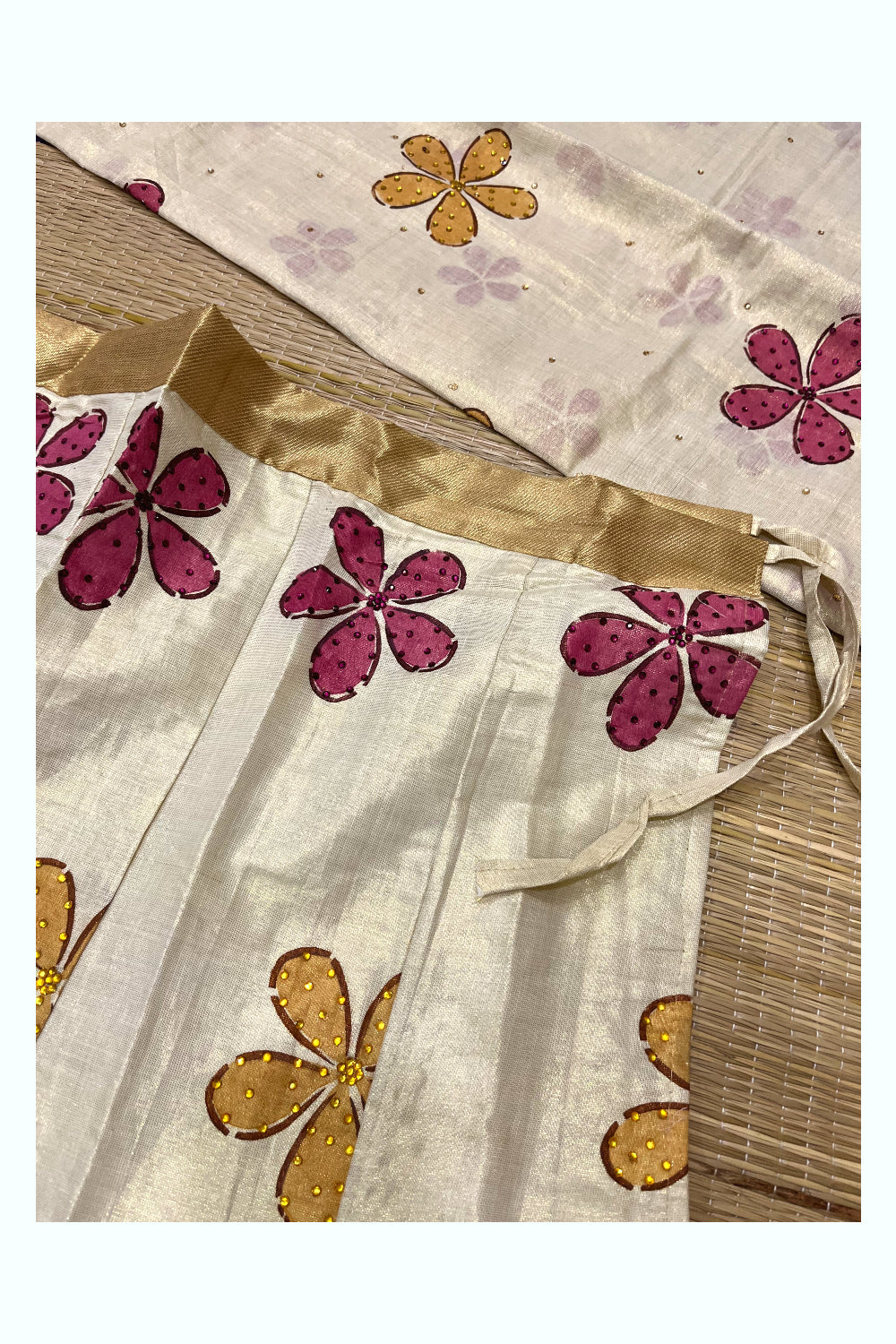 Southloom Semi Stitched Premium Tissue Dhavani Set with Floral Sequence Designs on Body and Purple Piping Works