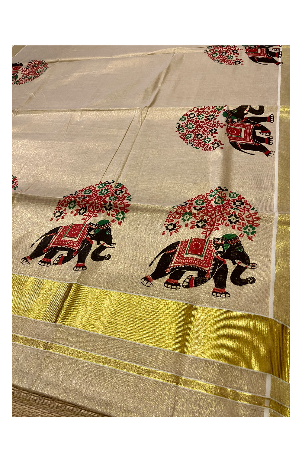 Kerala Tissue Kasavu Saree with Black and Red Elephant Mural Prints on Border and Pallu