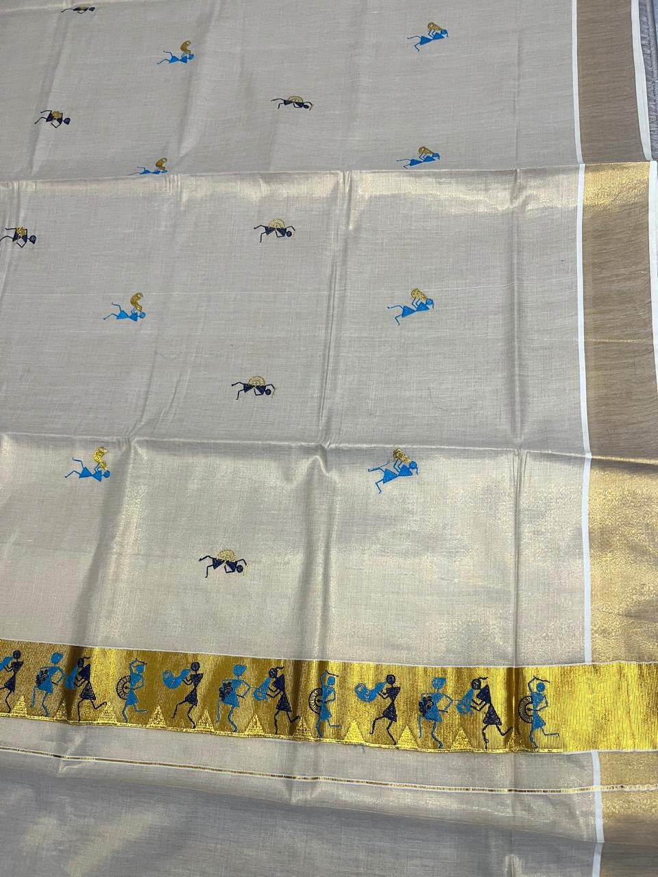 Southloom Kerala Tissue Kasavu Saree with Tribal Folk Art Embroidery Work on Body
