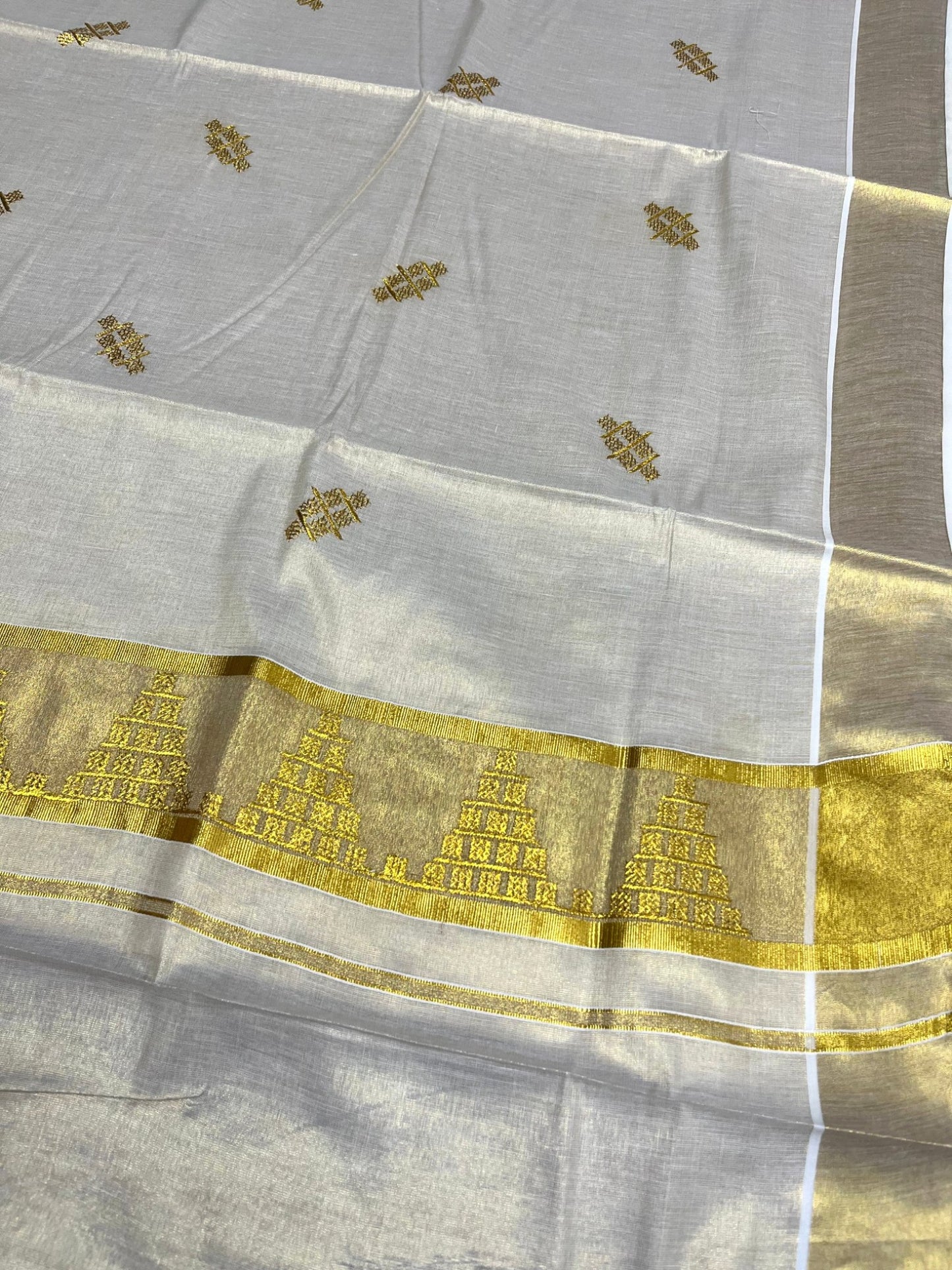 Southloom Tissue Kerala Kasavu Saree with Temple Embroidery Work on Body and Borders