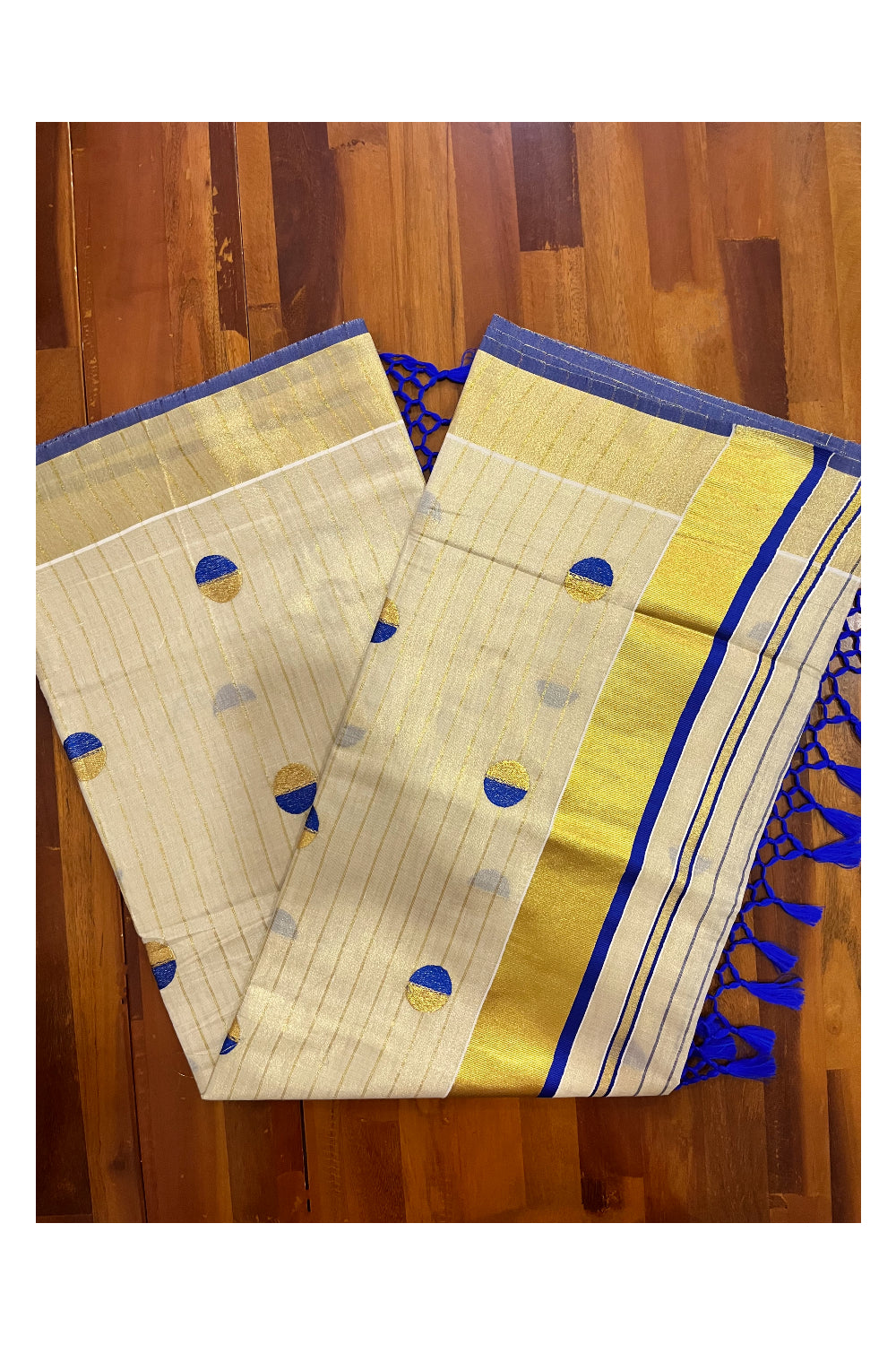 Kerala Tissue Kasavu Saree with Kasavu Lines Across Body and Blue Semi Polka Woven Designs