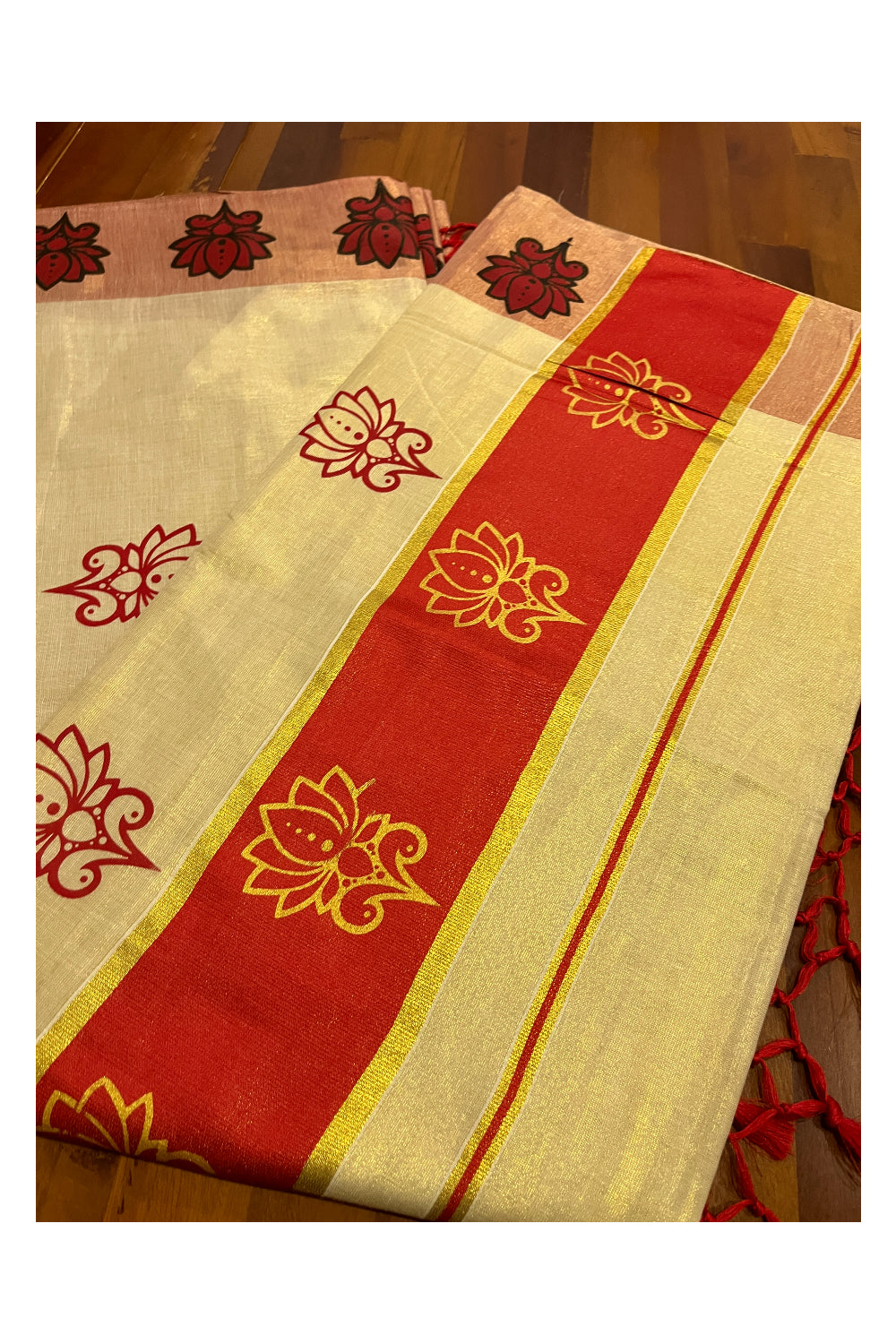 Kerala Tissue Kasavu Saree with Red and Golden Block Prints and Red Border