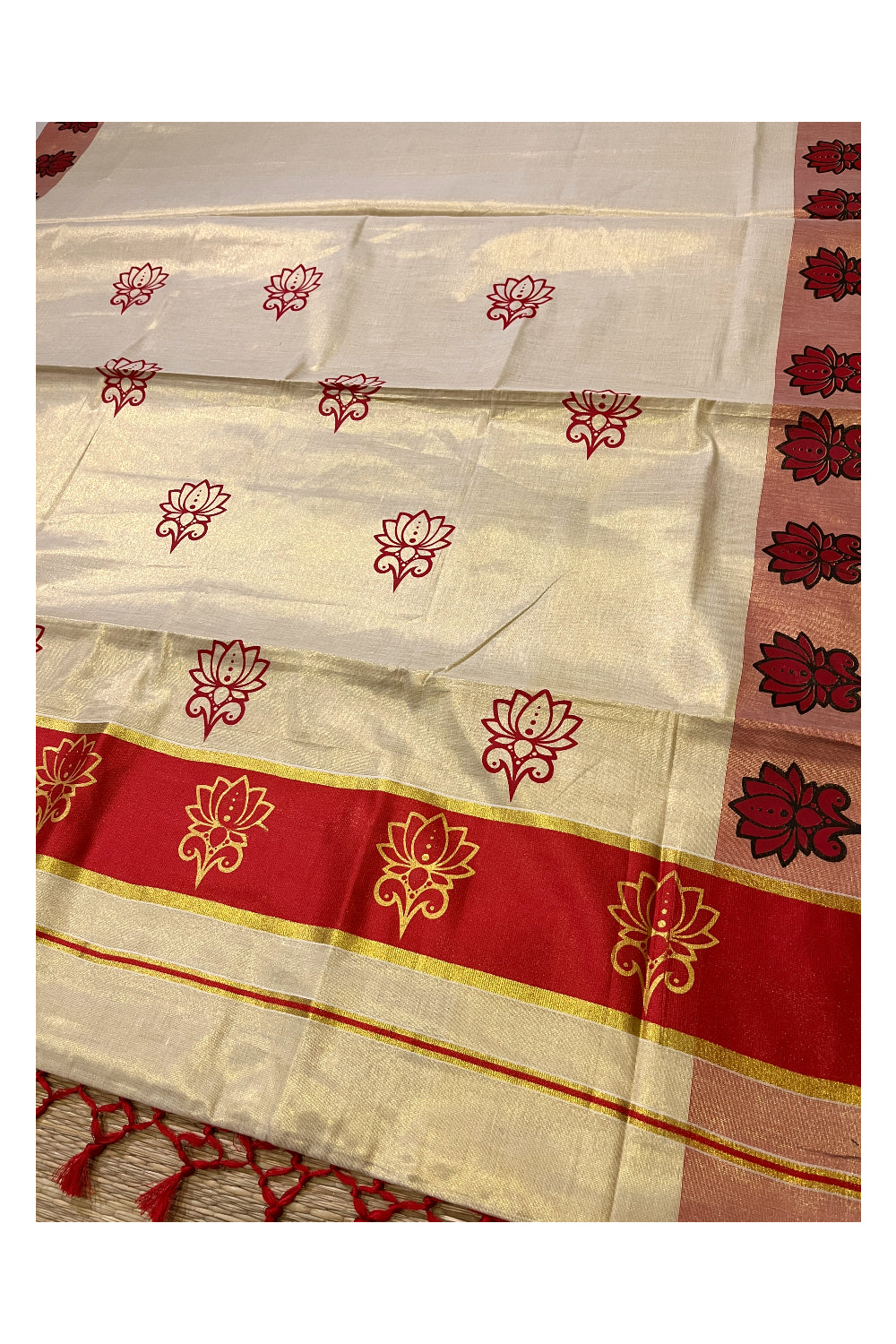 Kerala Tissue Kasavu Saree with Red and Golden Block Prints and Red Border