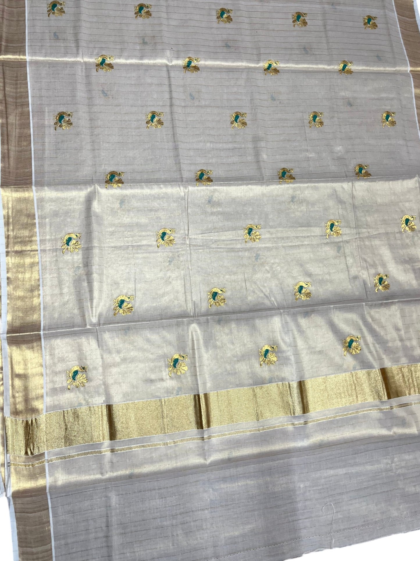 Southloom Tissue Kerala Kasavu Lines Saree with Peacock Embroidery Work on Body in Peacock Green