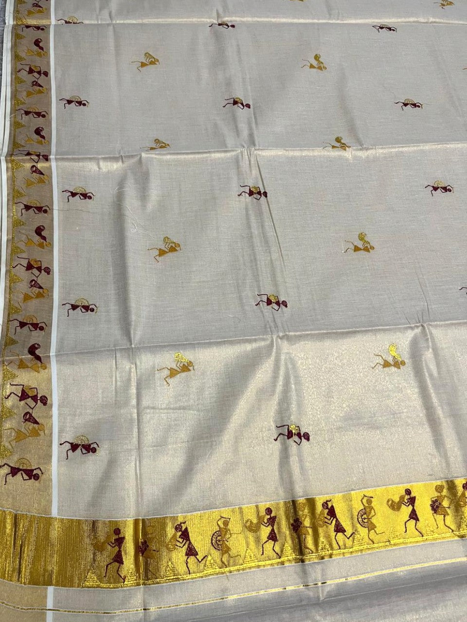 Southloom Kerala Tissue Kasavu Saree with Tribal Folk Art Embroidery Work on Body