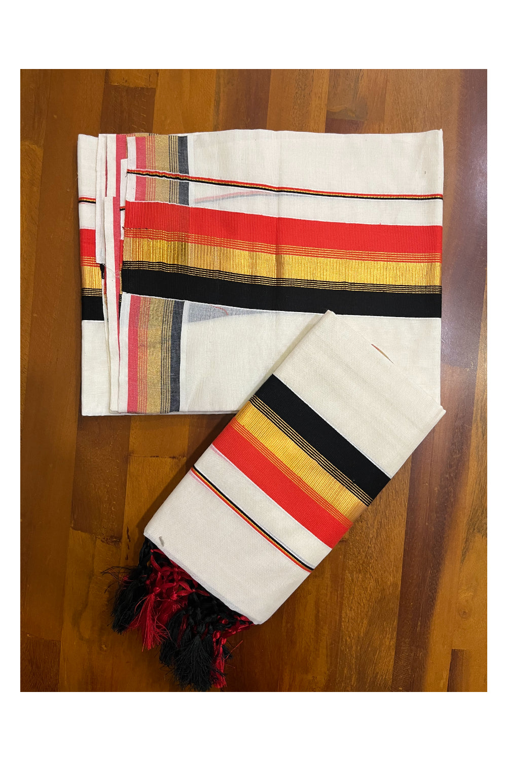 Cotton Kerala Kasavu Set Mundu (Mundum Neriyathum) with Orange and Black Border and Tassels