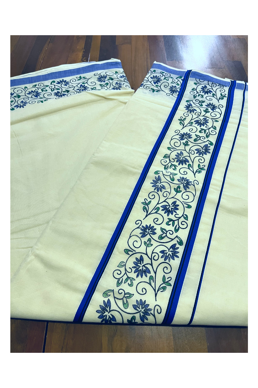 Pure Cotton Kerala Saree with Floral Block Prints and Blue Border