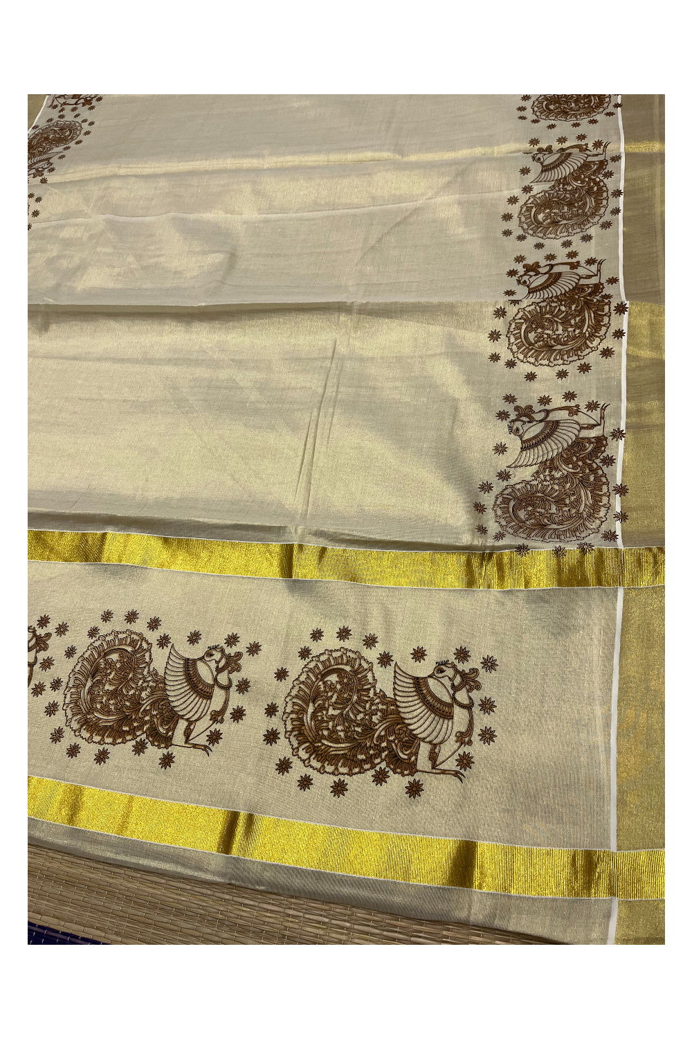 Kerala Tissue Kasavu Saree with Brown Peacock Block Printed Designs