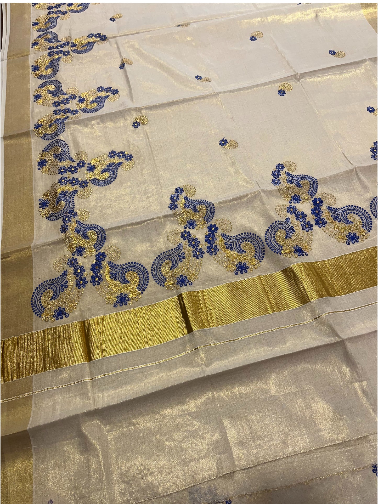 Southloom Kerala Tissue Kasavu Plain Saree with Gold and Blue Embroidery Works