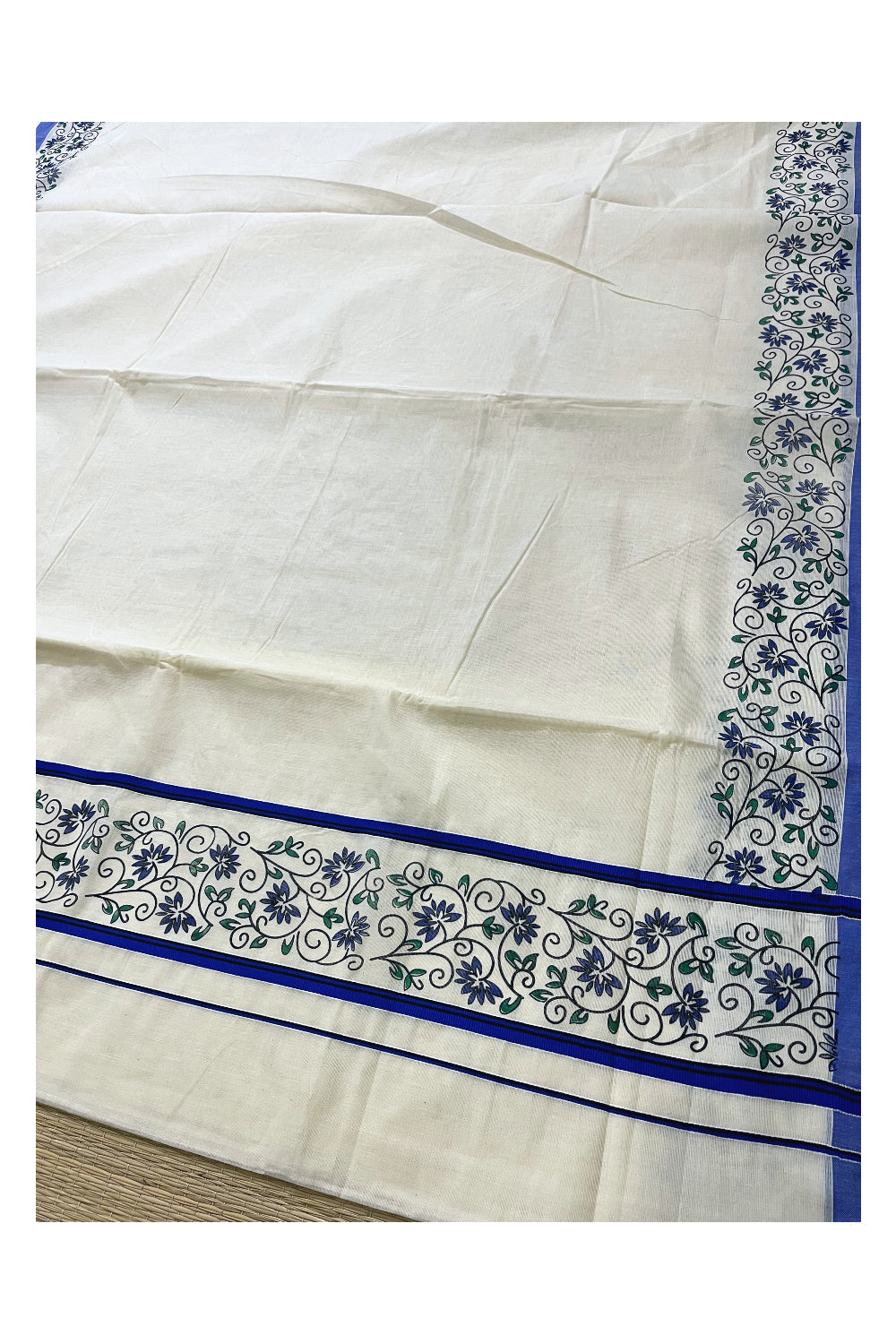 Pure Cotton Kerala Saree with Floral Block Prints and Blue Border