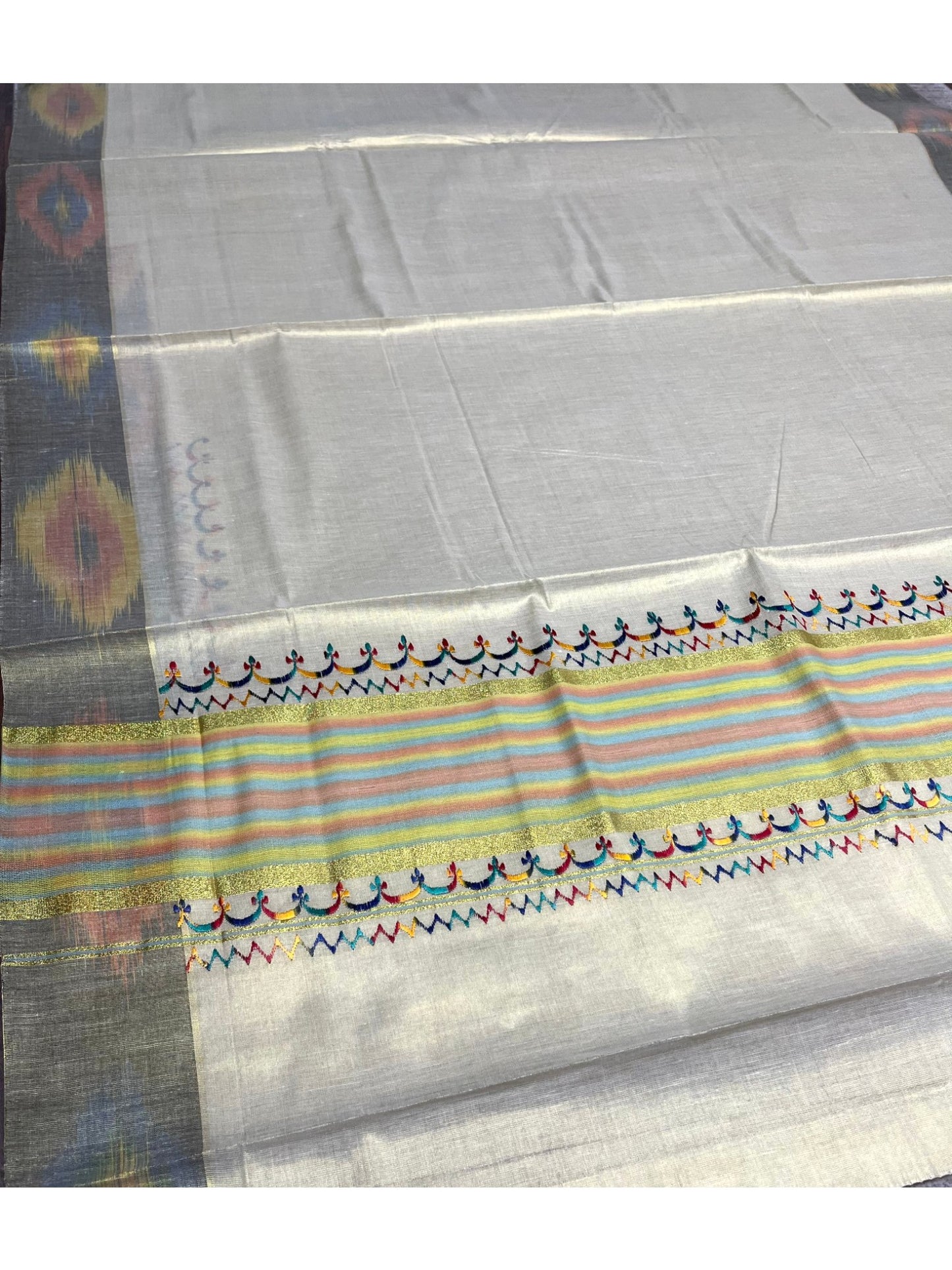 Southloom Kerala Tissue Kasavu Saree with Multi Colour Pochampally Design on Borders and Kara