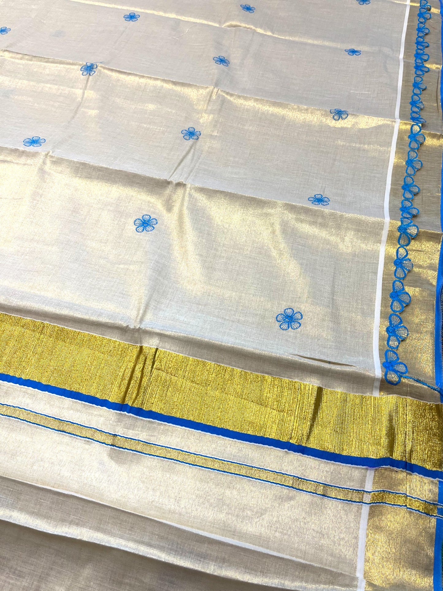 Southloom Kerala Tissue Kasavu Saree with Blue Floral Embroidery on Body and  Border