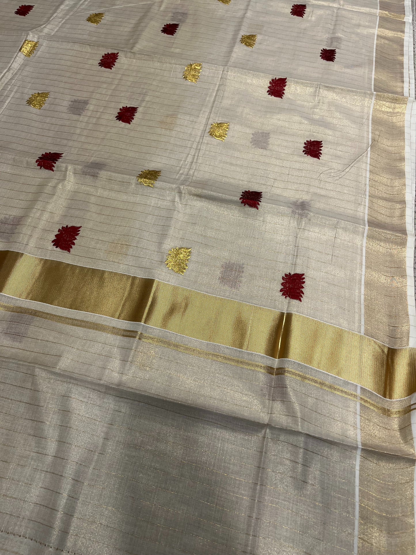 Southloom Kerala Tissue Kasavu Lines Saree with Maroon Lotus Embroidery Works