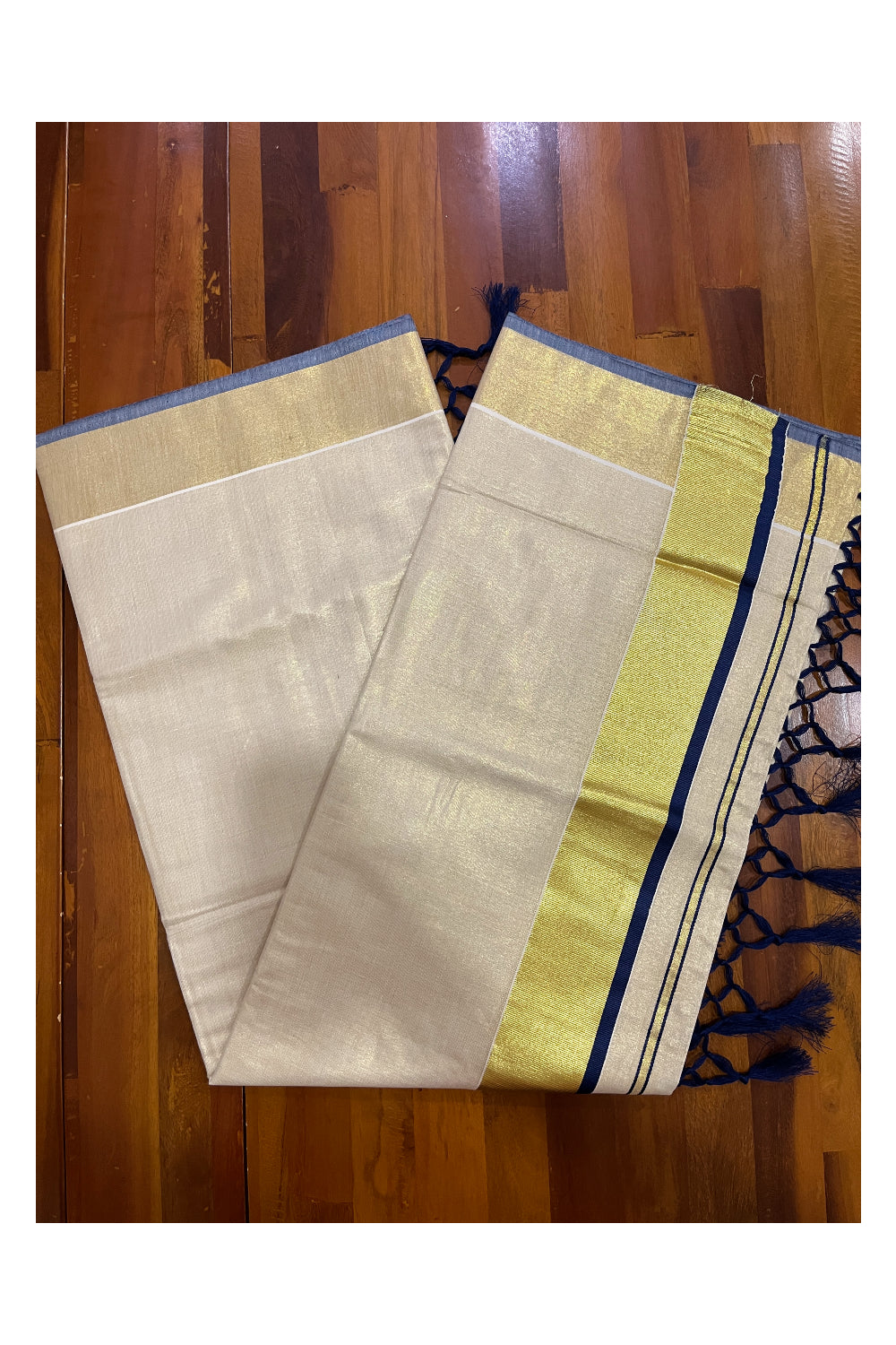 Kerala Kasavu Tissue Saree with Blue Narrow Border and Tassels