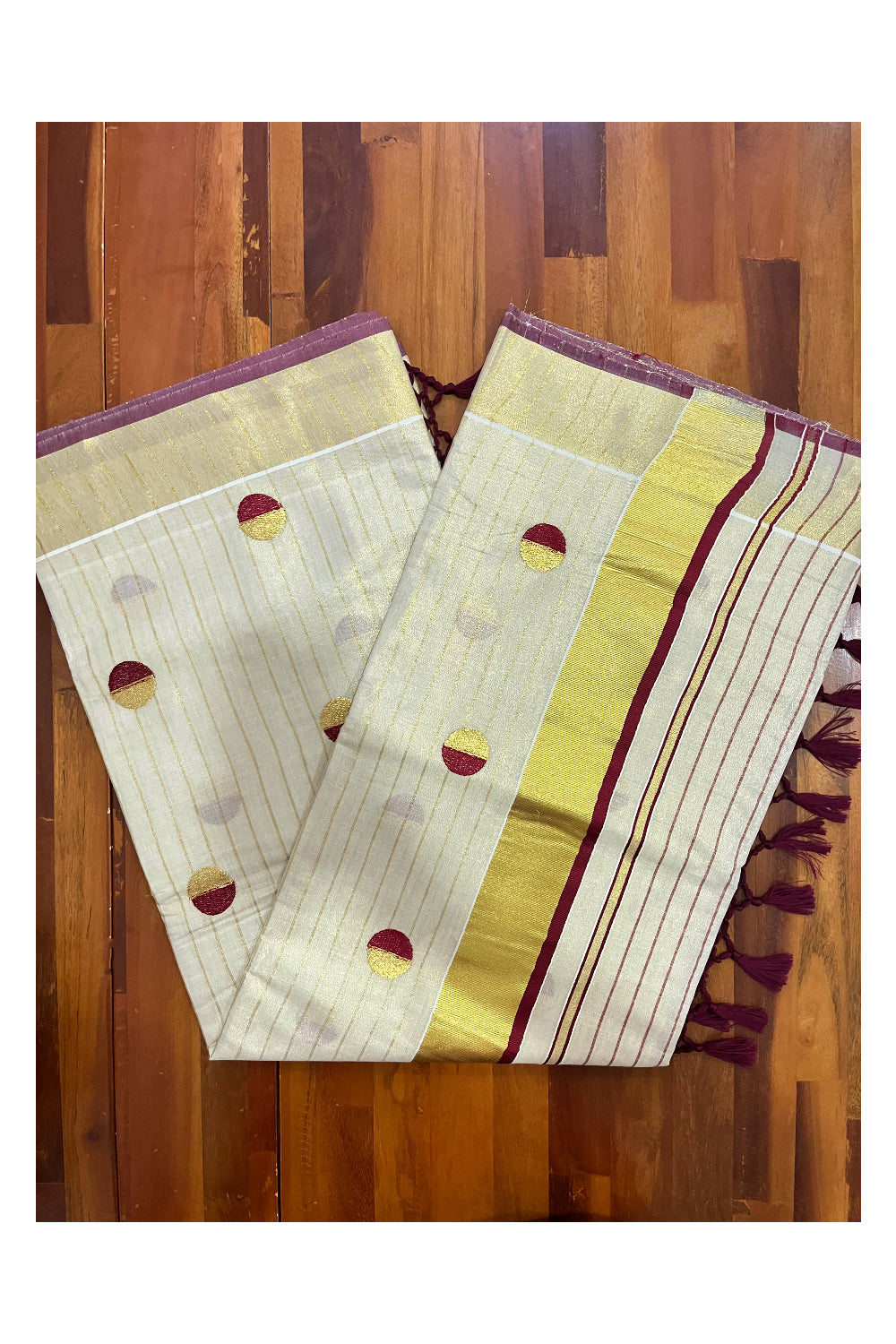 Kerala Tissue Kasavu Saree with Kasavu Lines Across Body and Maroon Semi Polka Woven Designs