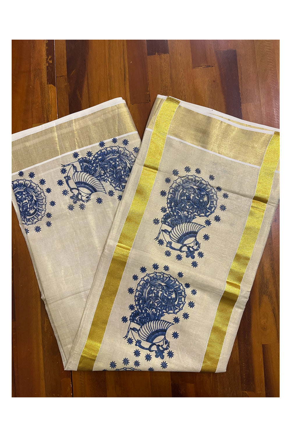 Kerala Tissue Kasavu Saree with Blue Peacock Block Printed Designs