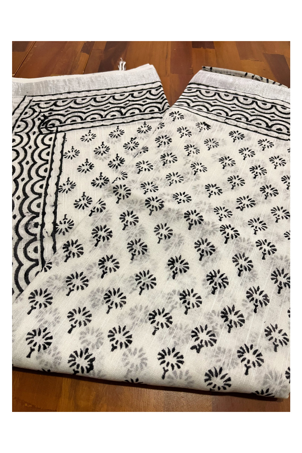 Southloom Linen Pure White Designer Saree with Black Prints and Tassels