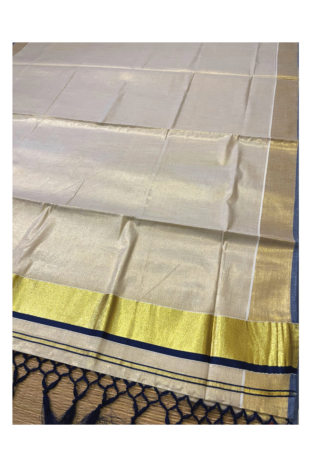 Kerala Kasavu Tissue Saree with Blue Narrow Border and Tassels