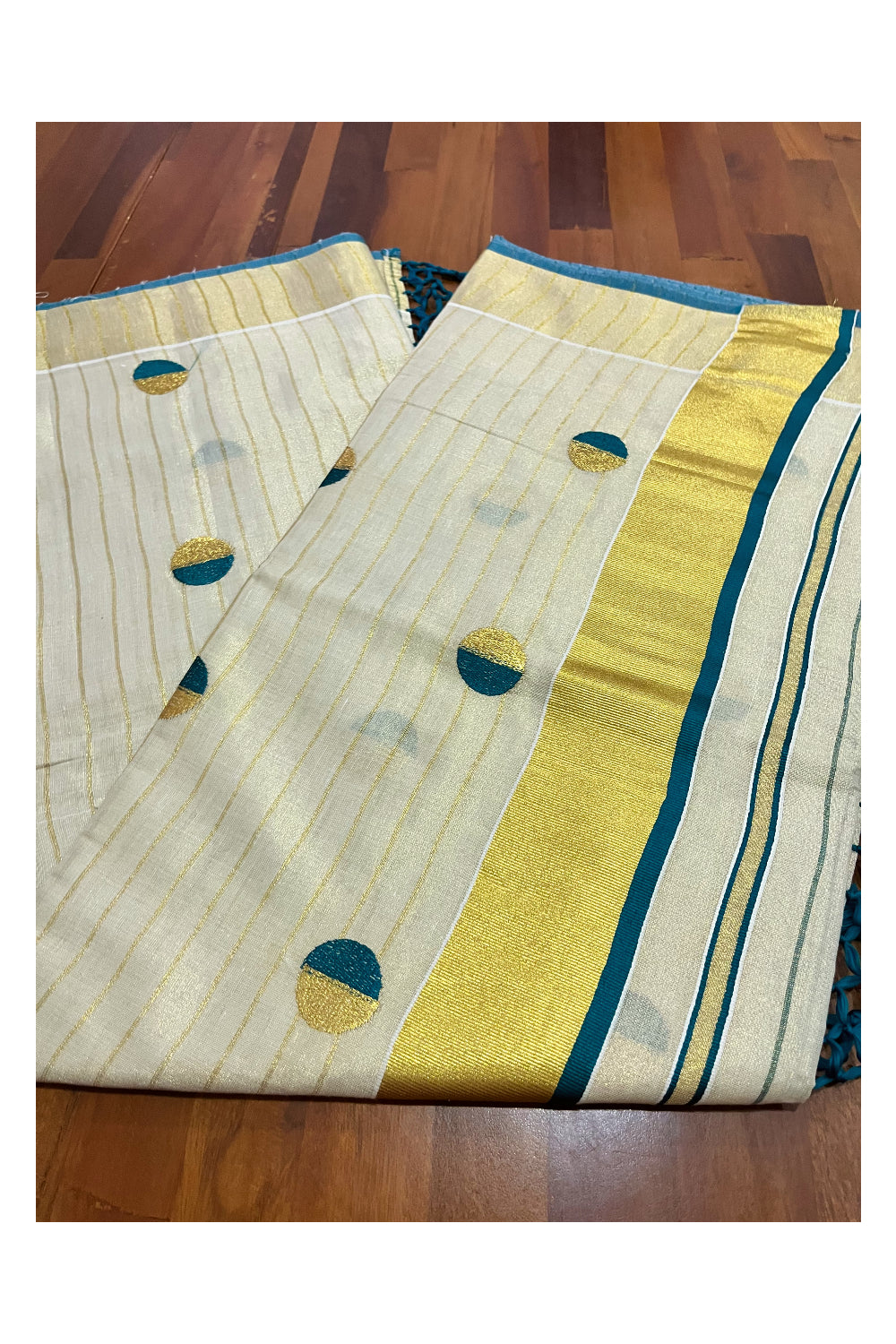 Kerala Tissue Kasavu Saree with Kasavu Lines Across Body and Green Semi Polka Woven Designs