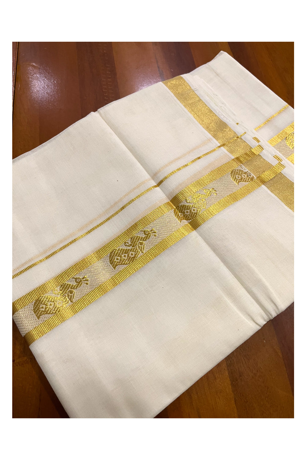 Southloom Premium Handloom Cotton Mundu with Kasavu Peacock Woven Border