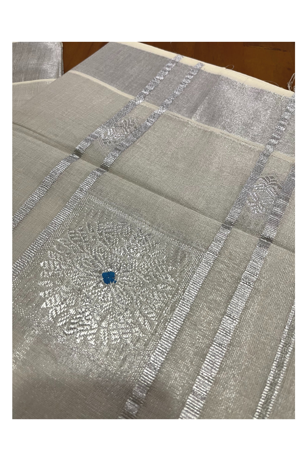 Kerala Silver Tissue Kasavu Saree with Floral Thread Designs on Pallu