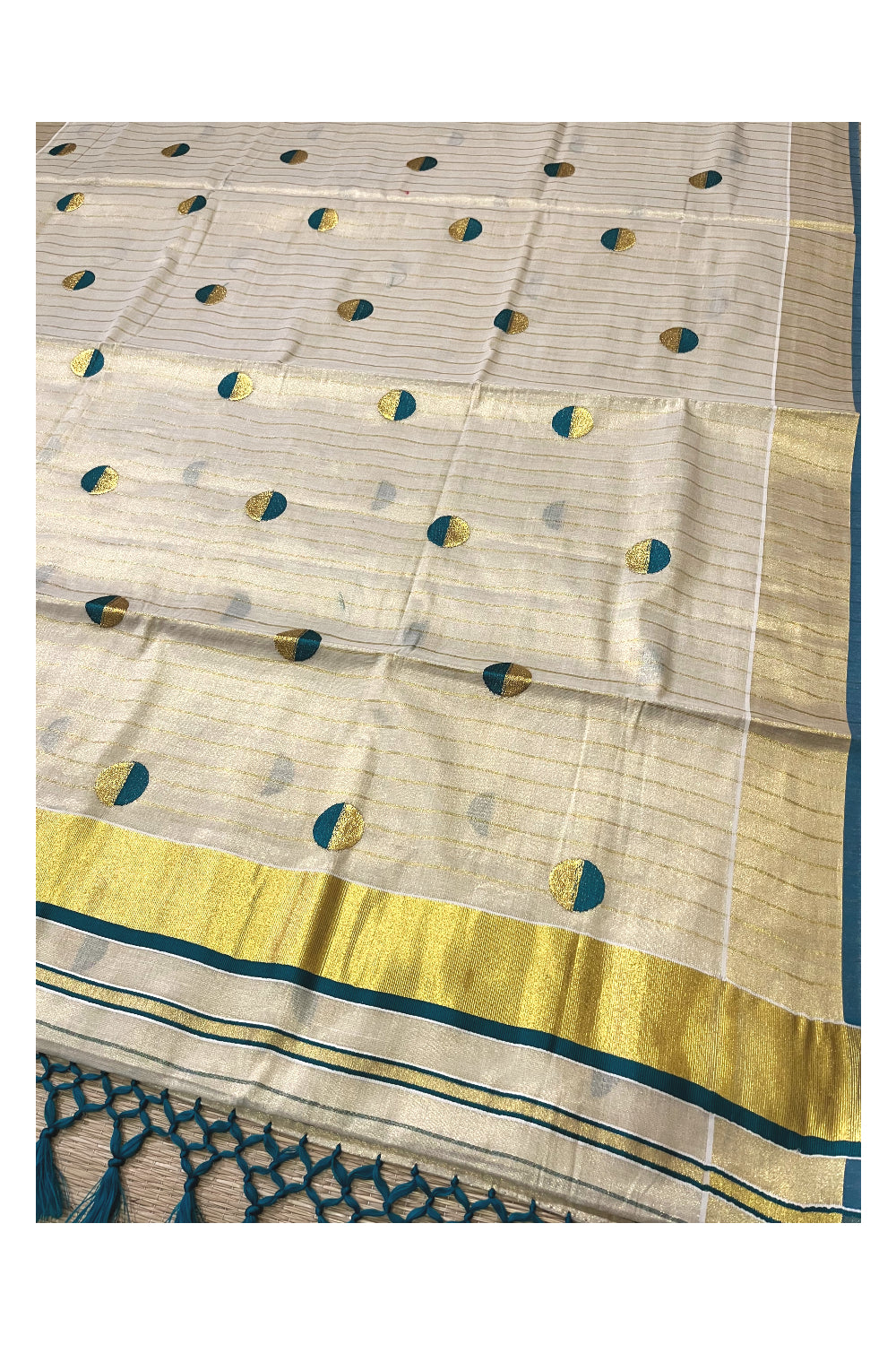 Kerala Tissue Kasavu Saree with Kasavu Lines Across Body and Green Semi Polka Woven Designs