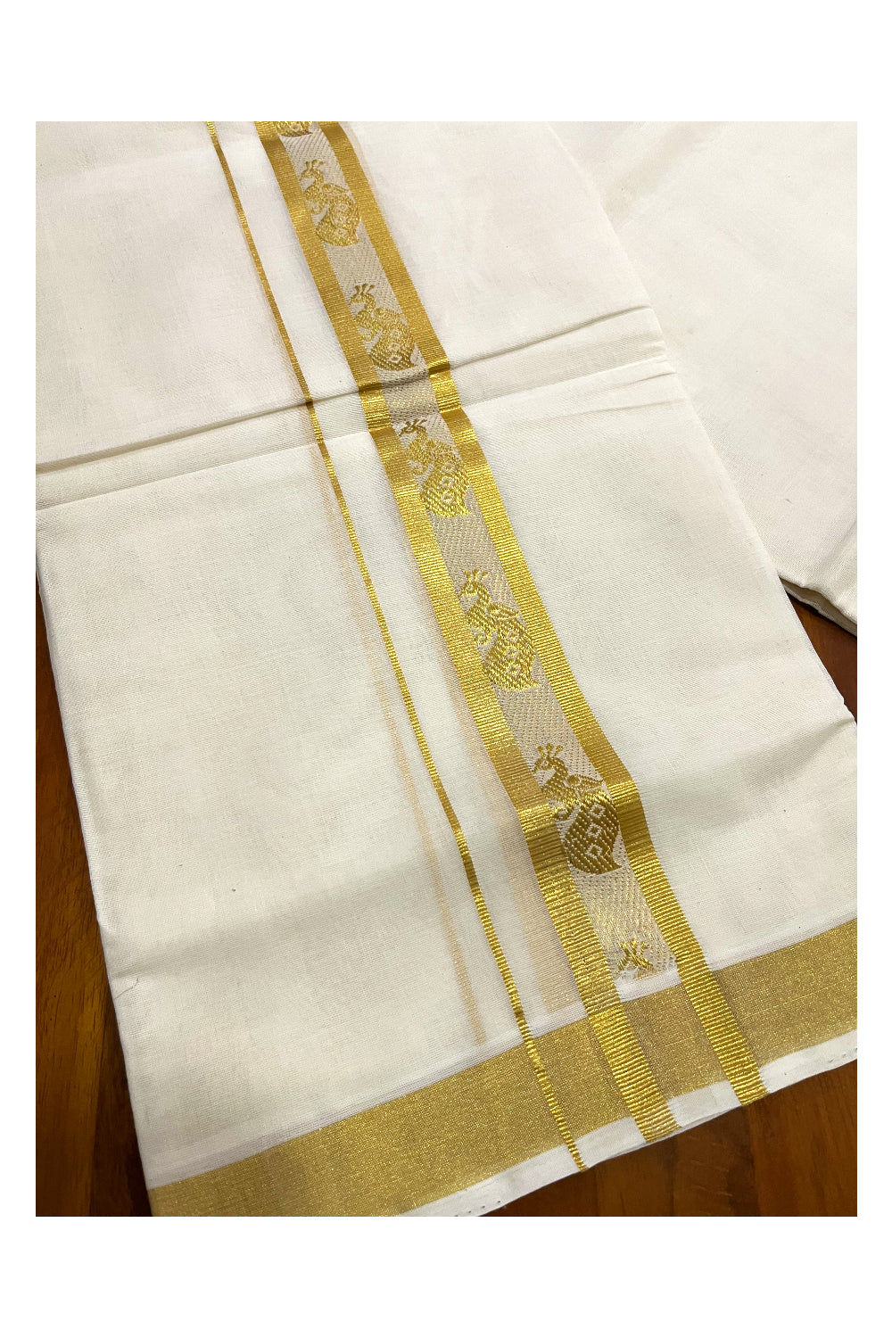 Southloom Premium Handloom Cotton Mundu with Kasavu Peacock Woven Border