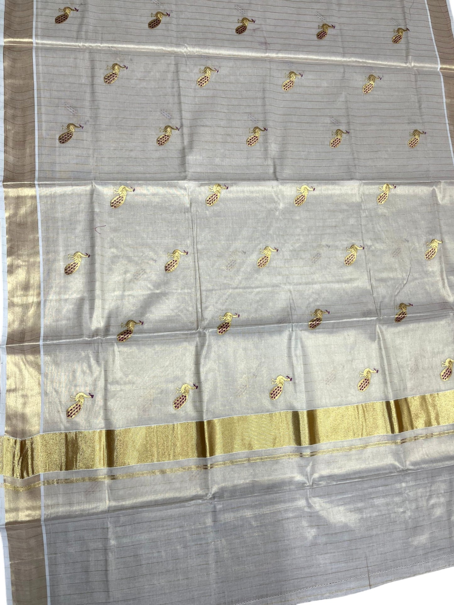 Southloom Tissue Kerala Kasavu Lines Saree with Peacock Embroidery Work on Body in Magenta