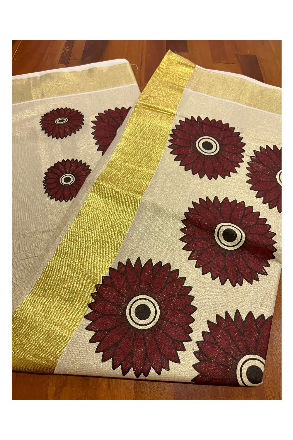 Southloom Exclusive Tissue Kasavu Saree With Maroon Sunflower Art On Body and Pallu