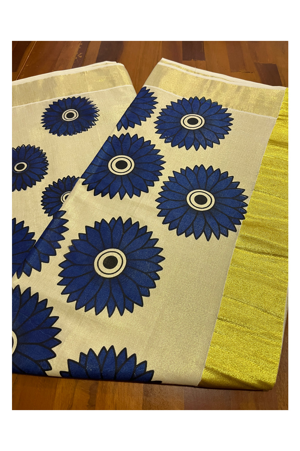 Southloom Exclusive Tissue Kasavu Saree With Blue Sunflower Art On Body and Pallu
