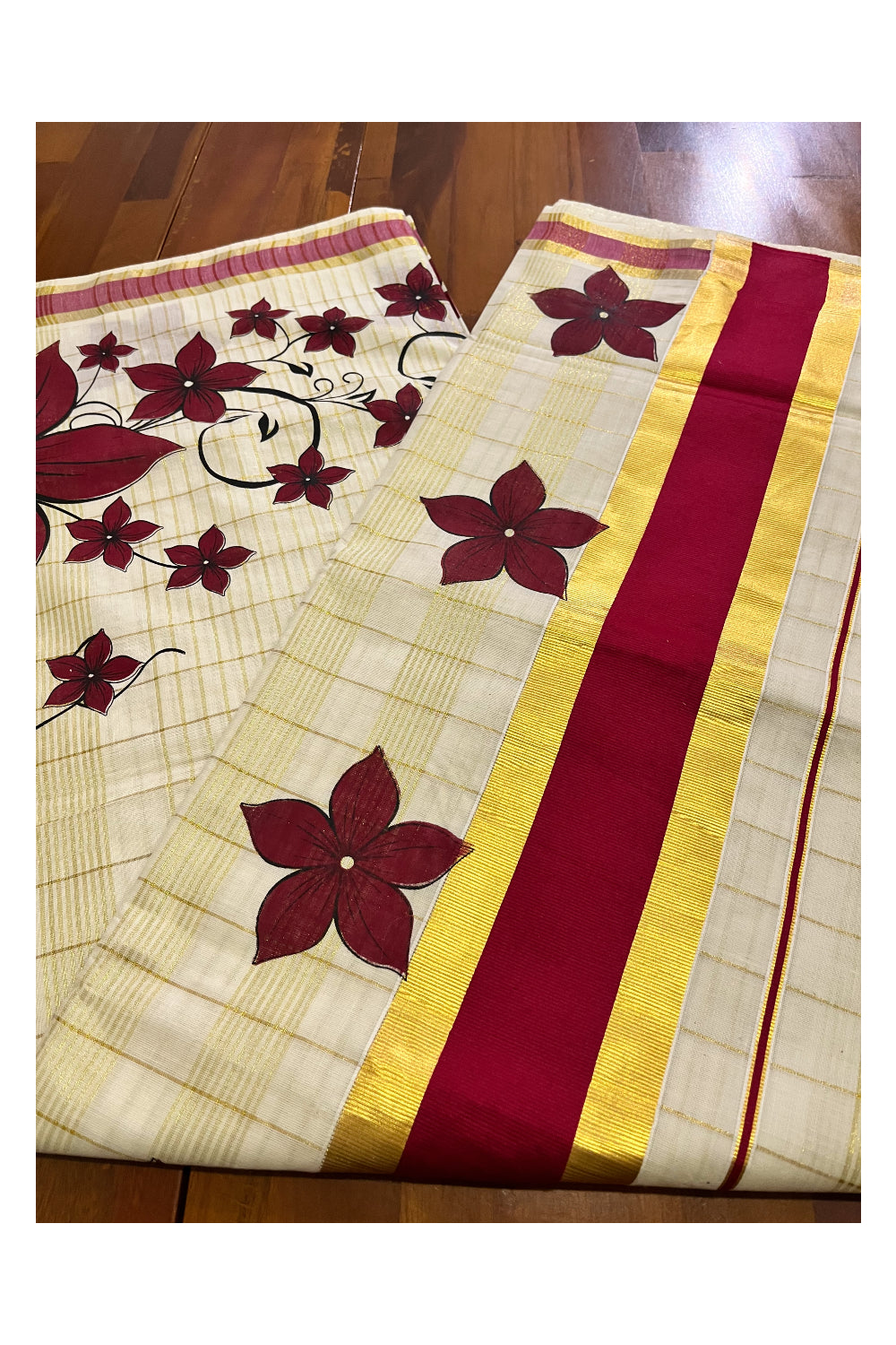 Pure Cotton Kerala Saree with Kasavu Checks and Floral Block Prints on Maroon Border