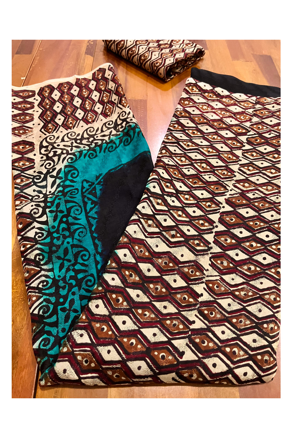 Southloom Black Crepe Fabric Saree with Brown Printed Blouse Piece