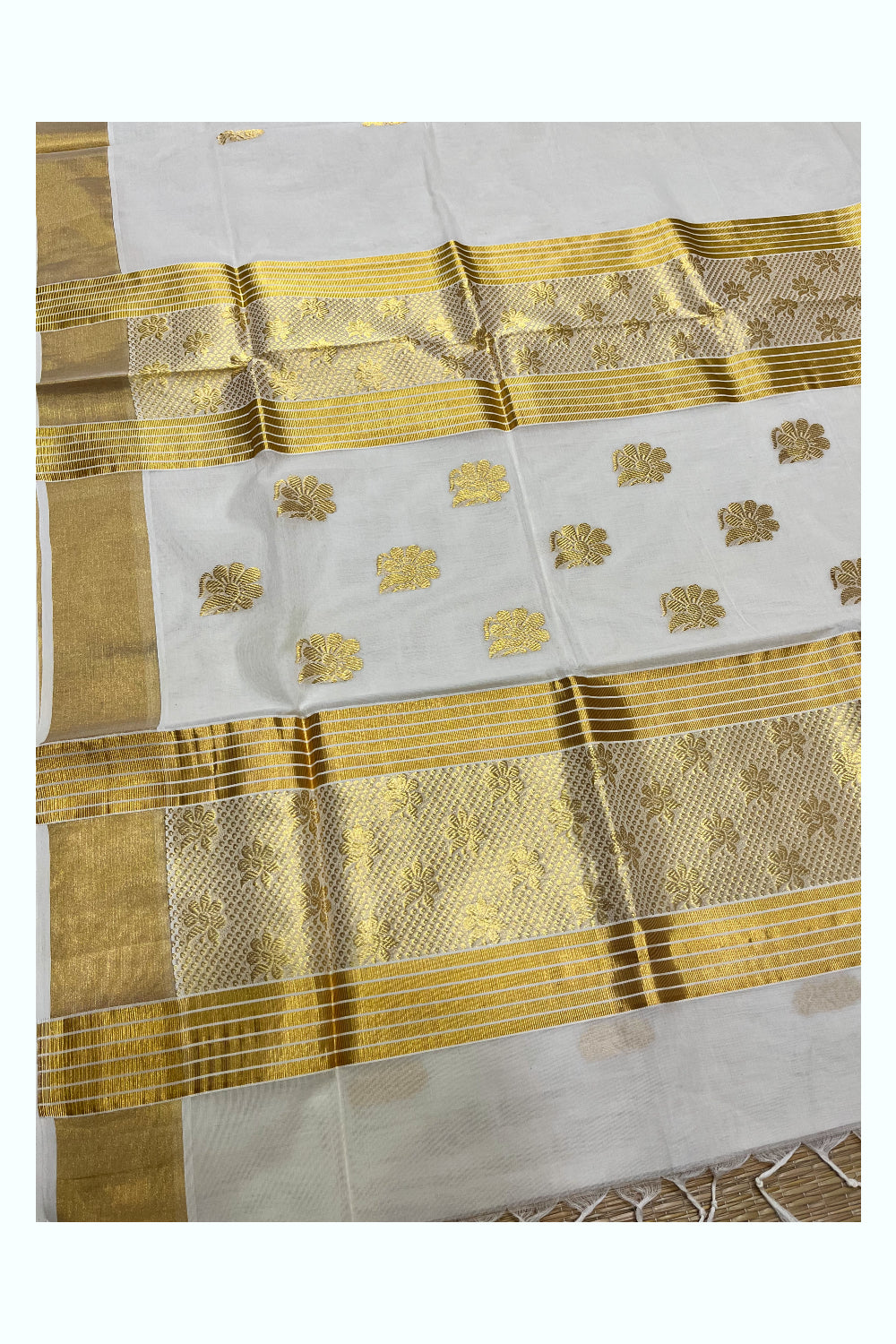 Southloom Premium Handloom Cotton Kasavu Saree with Floral Woven Designs (Vishu 2024 Collection)