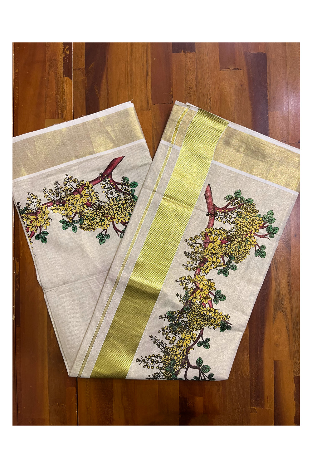 Kerala Tissue Kasavu Saree with Floral Prints on Body and Kasavu Border