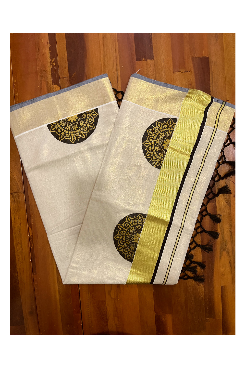 Kerala Tissue Kasavu Saree with Brown Block Prints and Kasavu Black Border