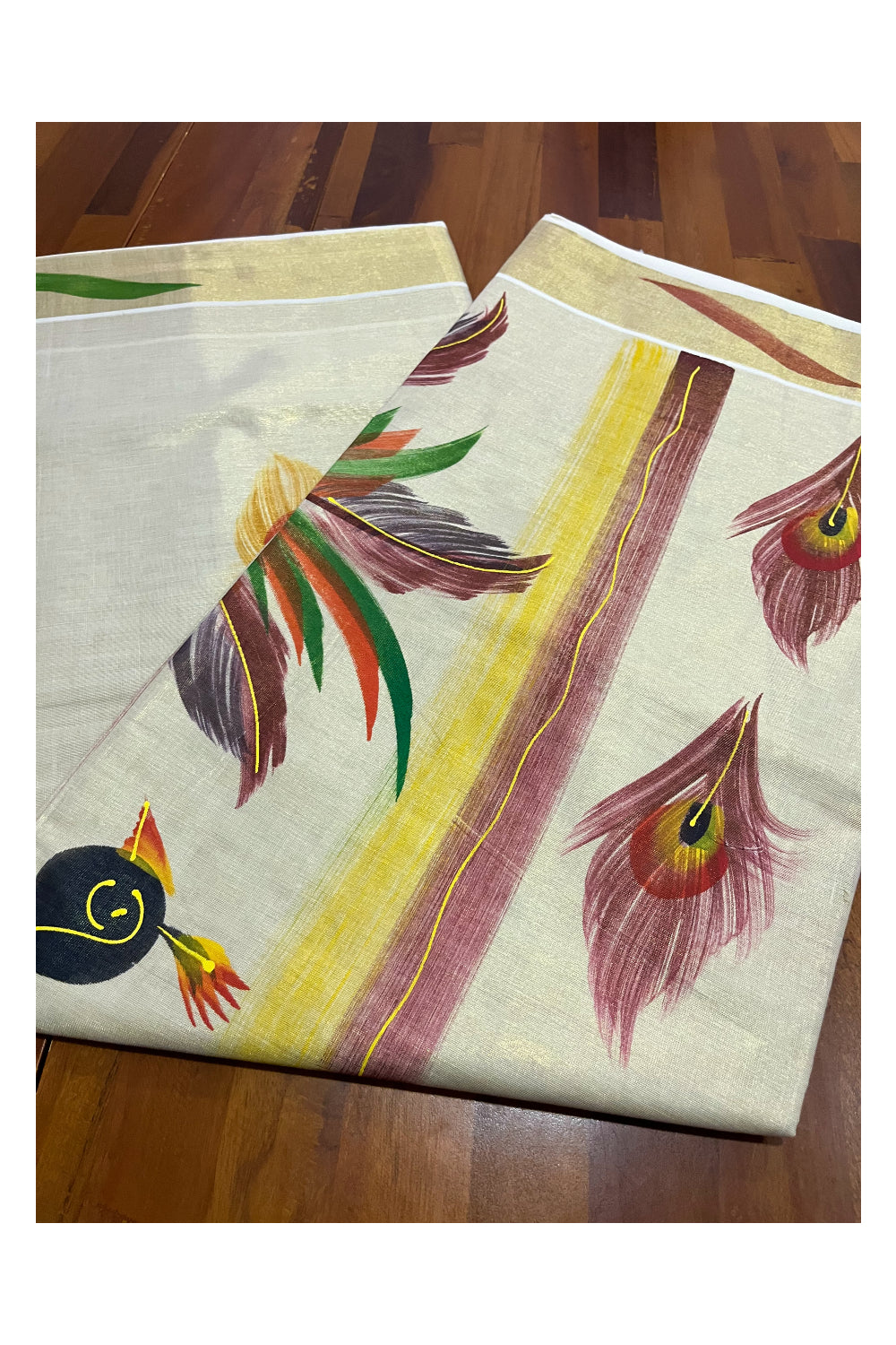 Kerala Tissue Kasavu Saree with Hand Painted Peacock Design