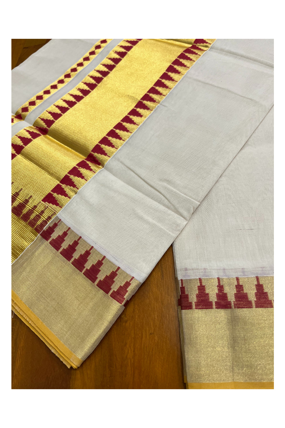 Southloom Super Premium Balaramapuram Unakkupaavu Handloom Maroon and Kasavu Saree with Temple Border