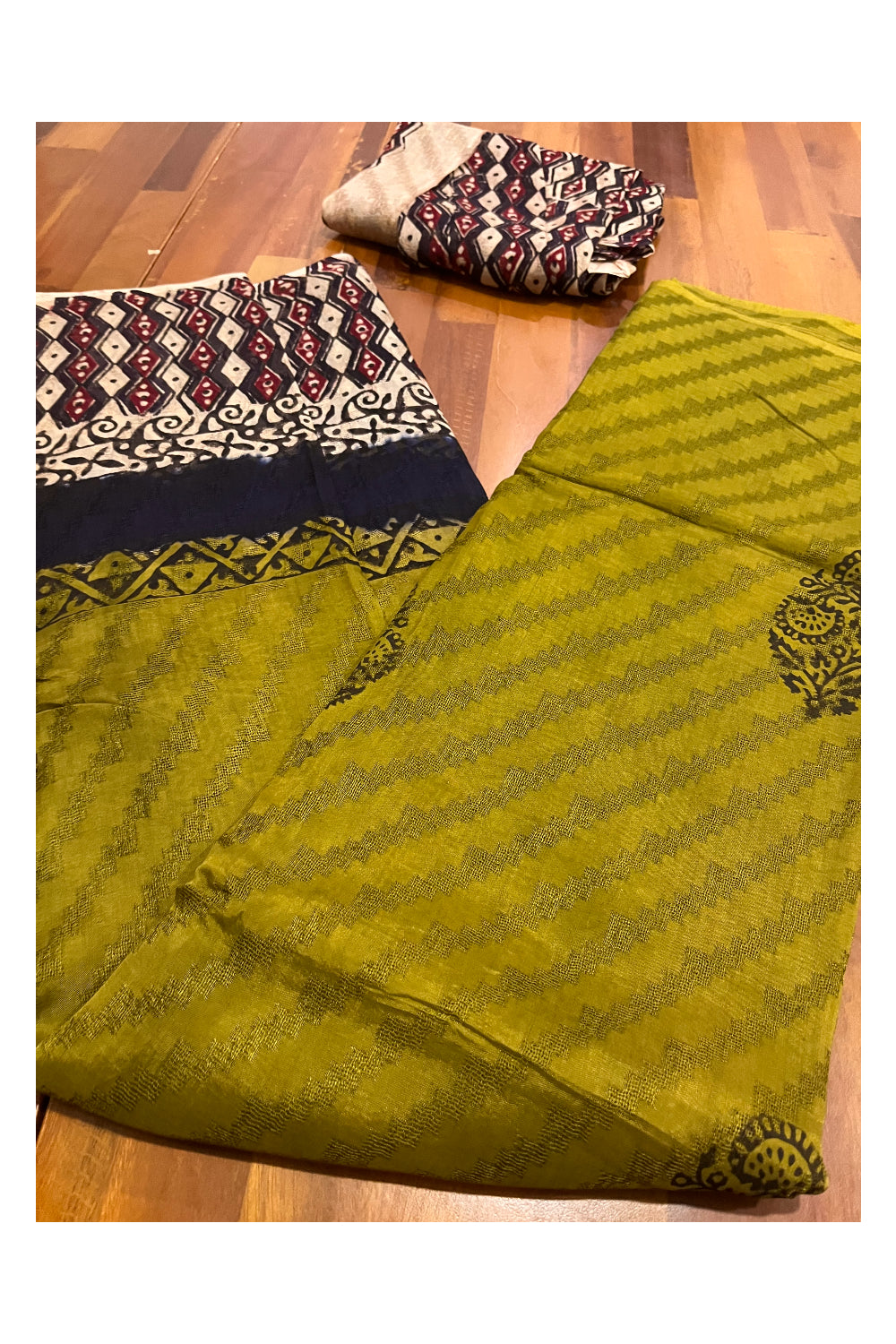 Southloom Olive Green Crepe Fabric Saree with Brown Printed Blouse Piece