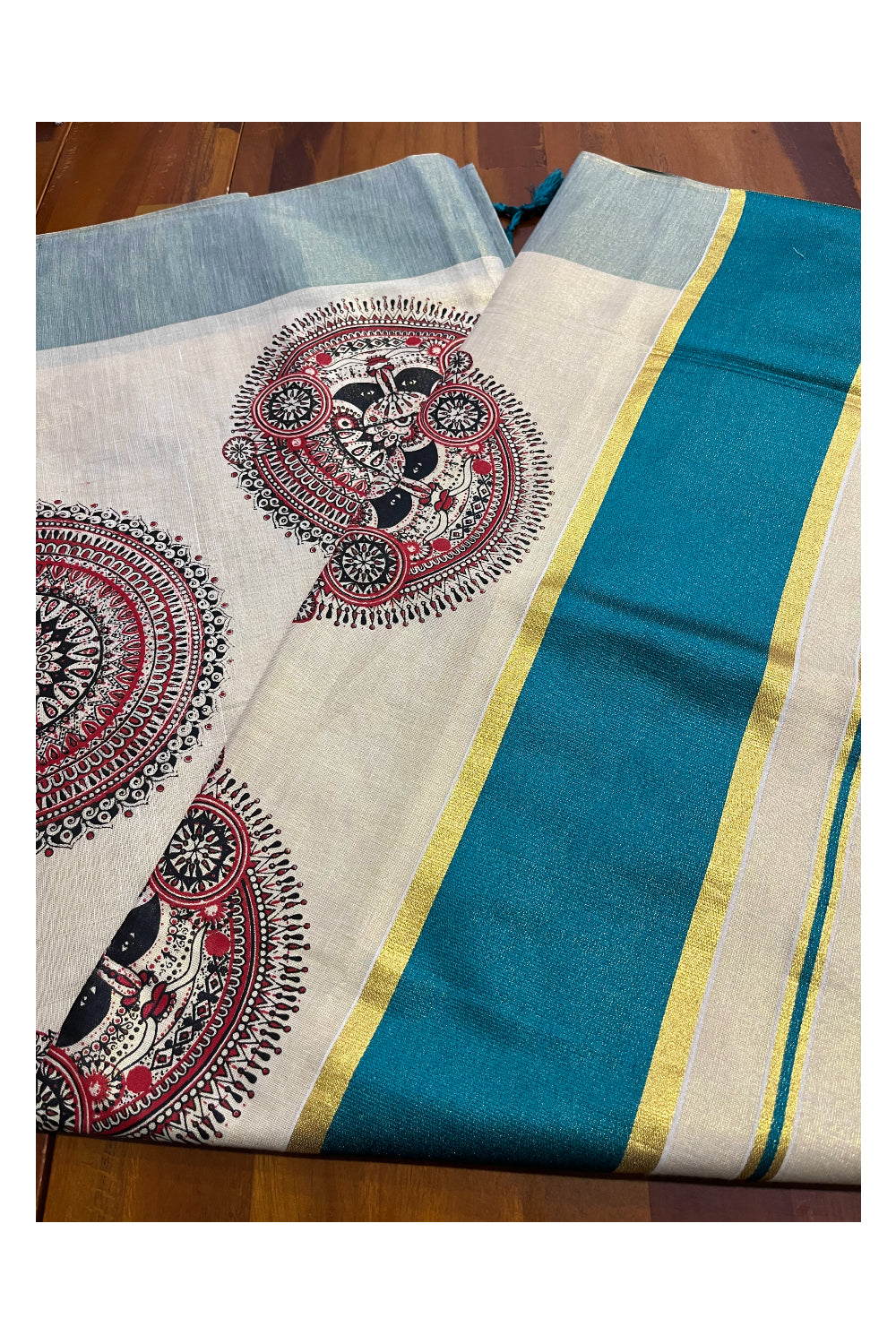 Kerala Tissue Kasavu Saree with Theyyam Mural Printed Designs and Teal Green Border