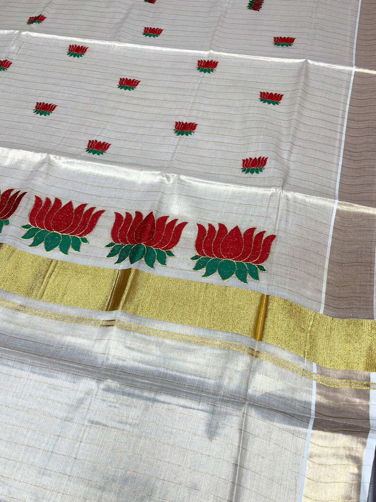 Southloom Kerala Tissue Lines Kasavu Saree with Red And Green Lotus Embroidery Works SL289