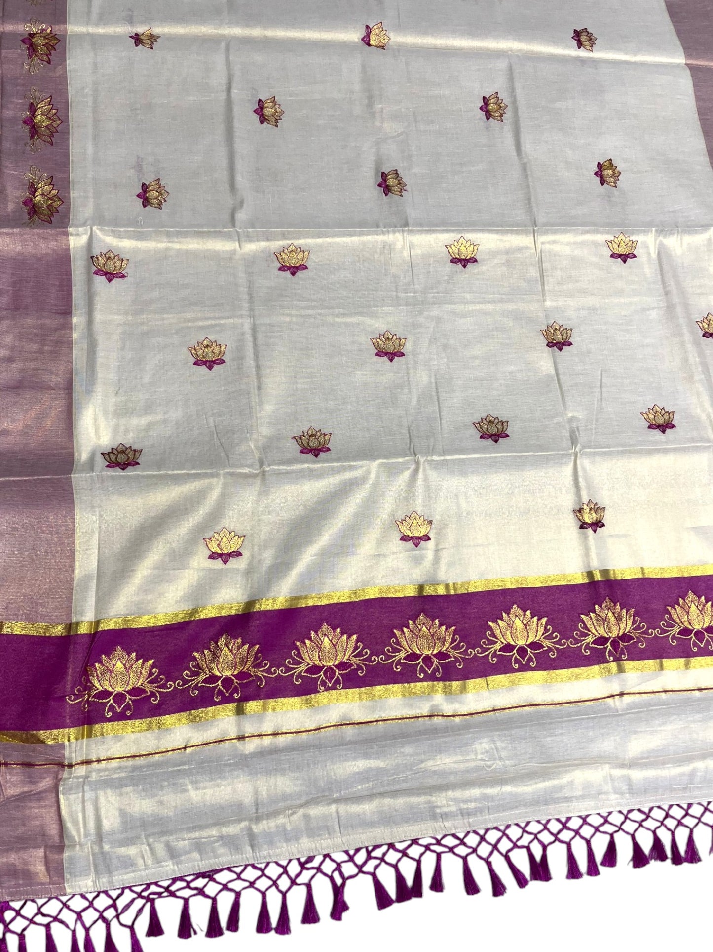Southloom Kerala Tissue Kasavu Saree with Magenta And Golden Lotus Embroidary Designs on Body SL273