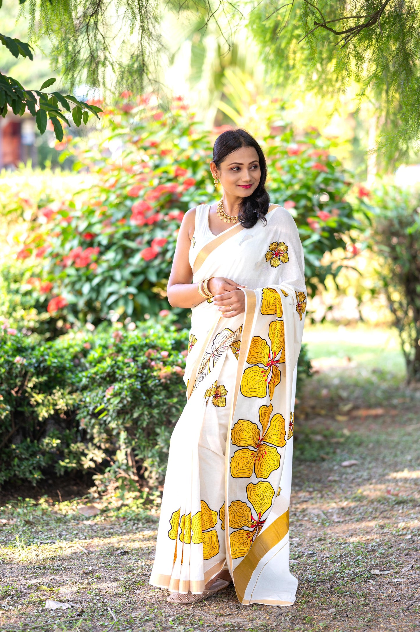 Kerala Cotton Kasavu Saree with Yellow Floral Embroidery Works