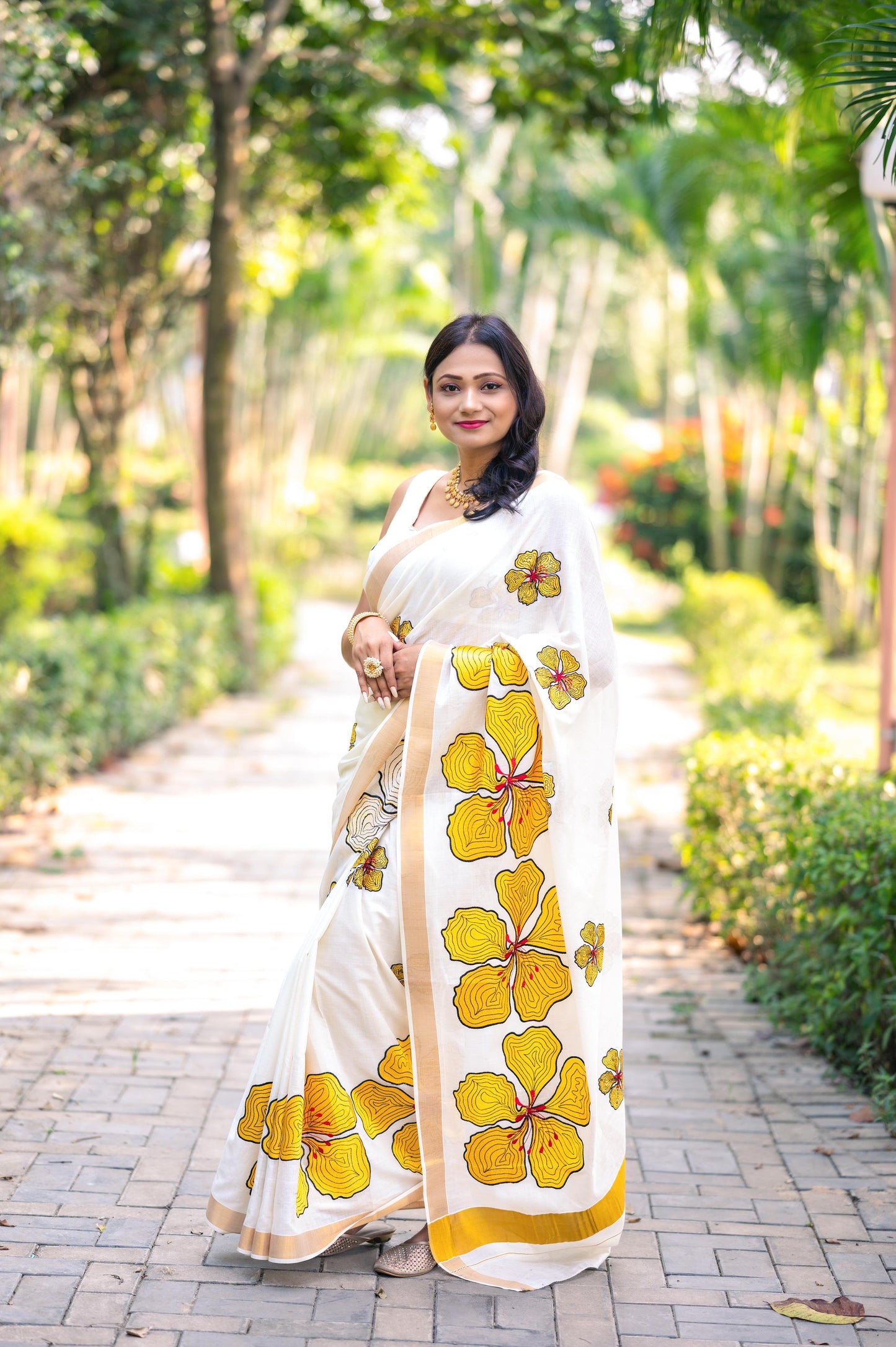 Kerala Cotton Kasavu Saree with Yellow Floral Embroidery Works