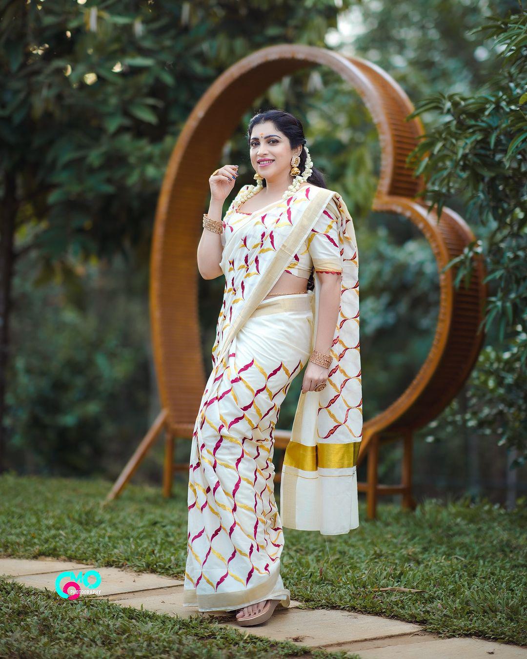 Southloom Cotton Kerala Kasavu Saree with Red and Golden Floral Designs