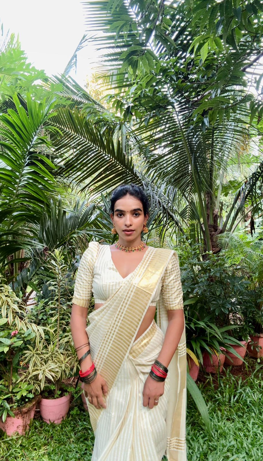 Kerala Tissue Kasavu Saree with Lines Design on Body