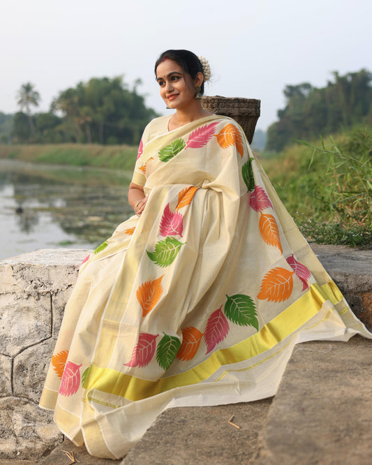 Kerala Tissue Saree with Vibrant Colour Big Leaf Designs on Border