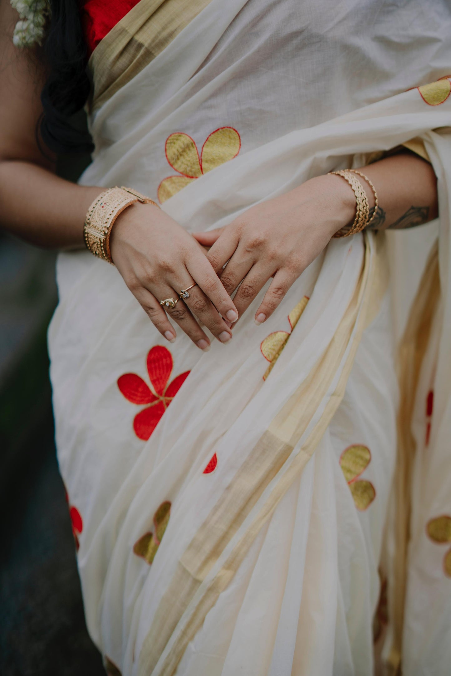 Southloom Cotton Kerala Kasavu Saree with floral red embroidery Designs